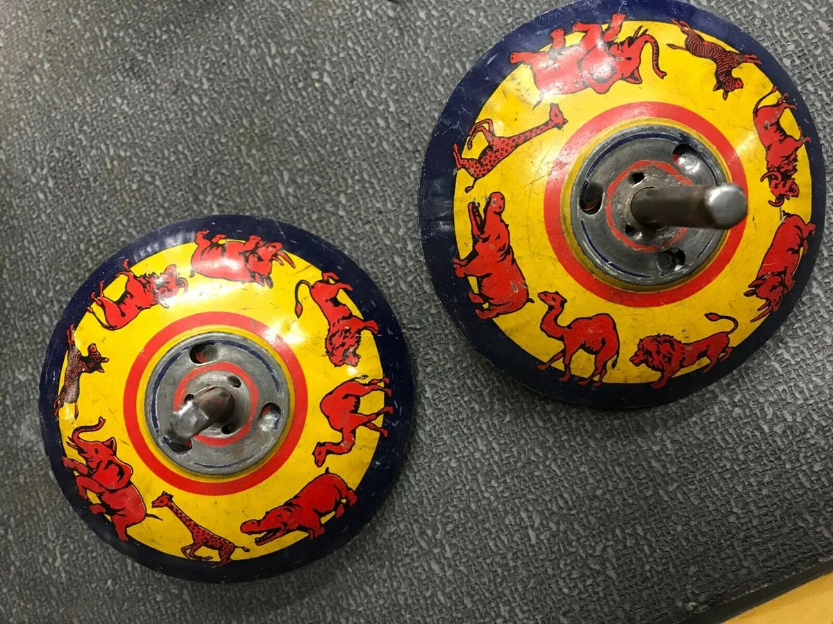 Vintage Set Metal Toy Spinner Tops Clown Circus Rhino Elephant Camel Lion Pair